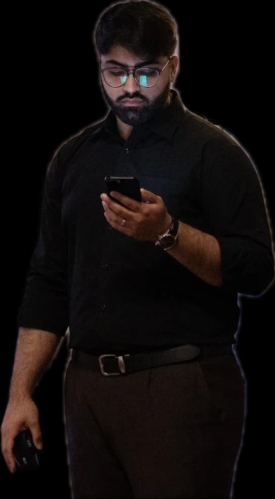 A builder checking their phone